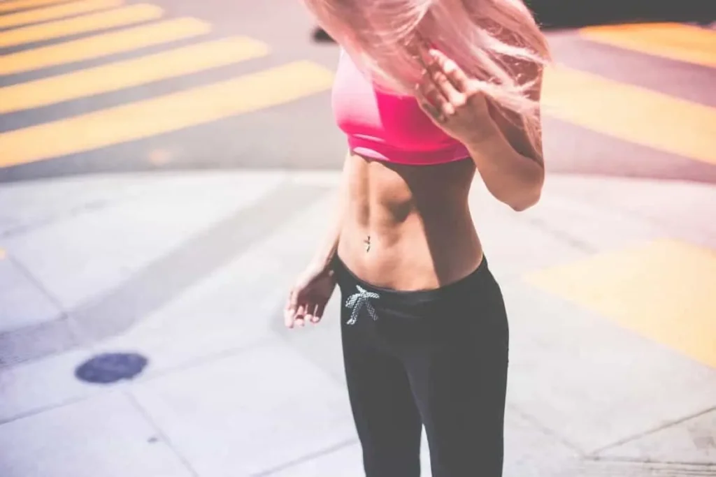 Woman with toned stomach after LA-EMS Body Sculpting Treatment Hemel Hempstead
